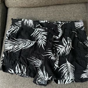 Black paper bag style shorts